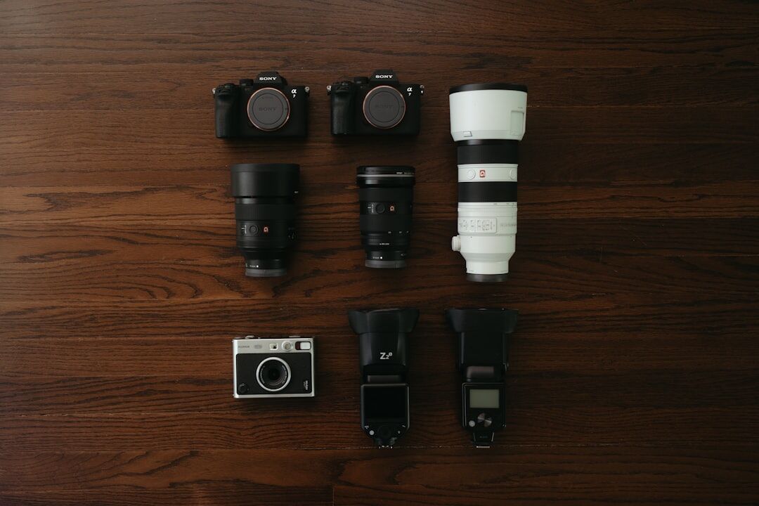 Close-up of professional camera and lens equipment on a table